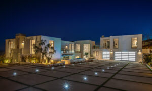 Night time photo of a large home