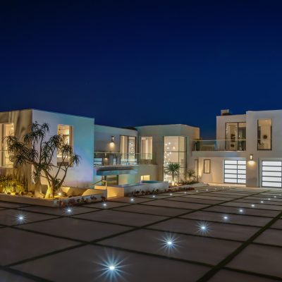 Night time photo of a large home