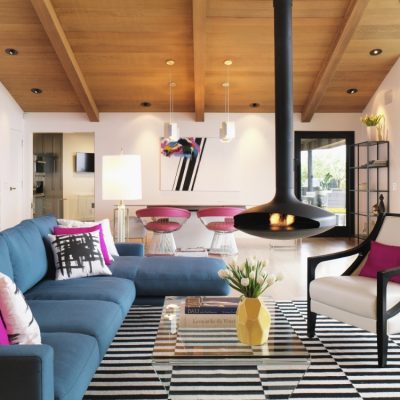 The home of actress Jennie Garth, in the hills of Studio City, above Universal Studios and the San Fernando Valley, Los Angeles, CA. Pictured:the living room, with dining room in background.